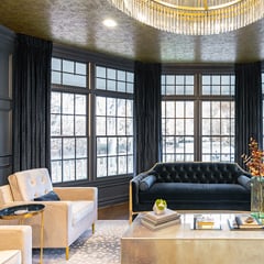Living room with dark drapes